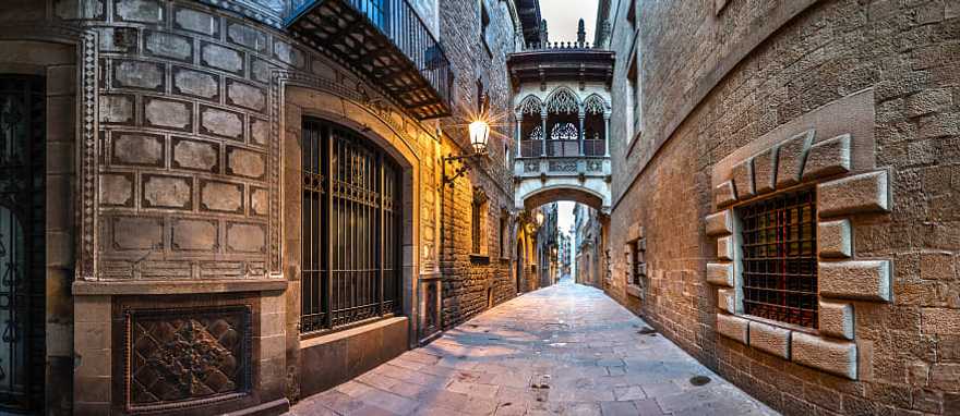 Street lights illuminate balconies in the Gothic Quarter, Barcelona, Spain