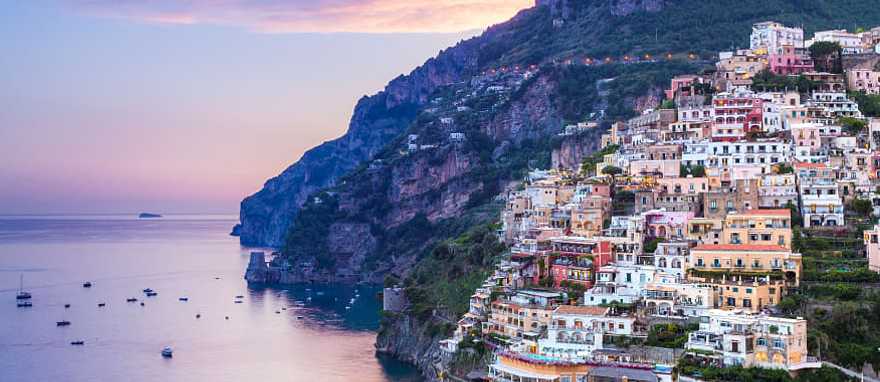 Hillside town of Positano looking out to the mediterranean at sunset in Italy's Amalfi Coast Hillside town of Positano looking out to the mediterranean at sunset in Italy's Amalfi Coast