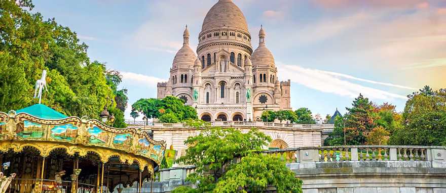 Montmartre in Paris, France Carousel below the step of Sacre Coeur in Montmartre, Paris, France