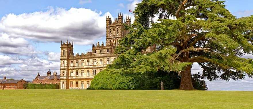 Highclere Castle in England used as the setting in Downton Abbey. Highclere Castle in England used as the setting in Downton Abbey.