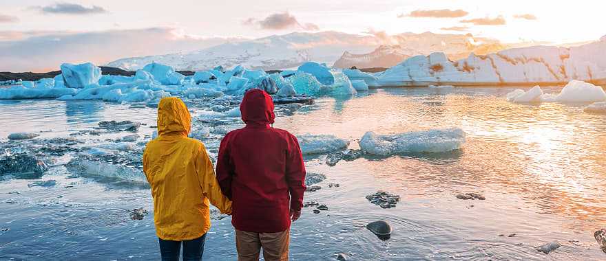 couple at Jokulsarlon Glacier Lagoon in Iceland