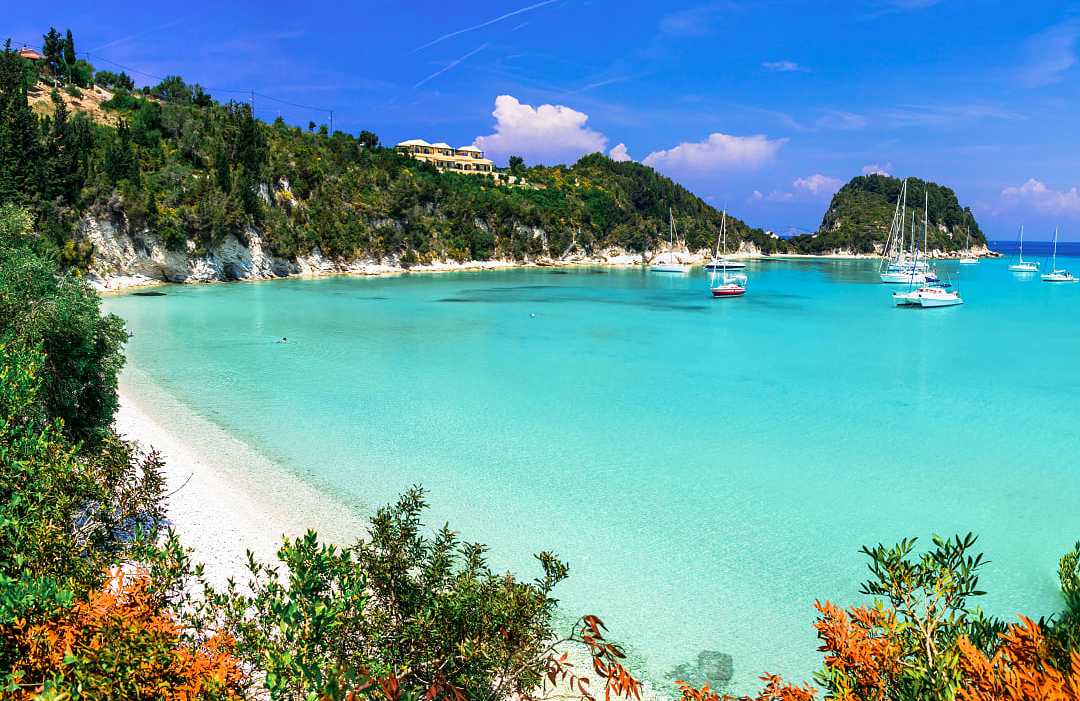 Gorgeouse beach and the clear blue Mediterranean sea in Paxos, Greece