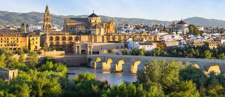Morning view of the Cathedral, Mezquita and roman bridge in Córdoba, Spain Morning view of the Cathedral, Mezquita and roman bridge in Córdoba, Spain