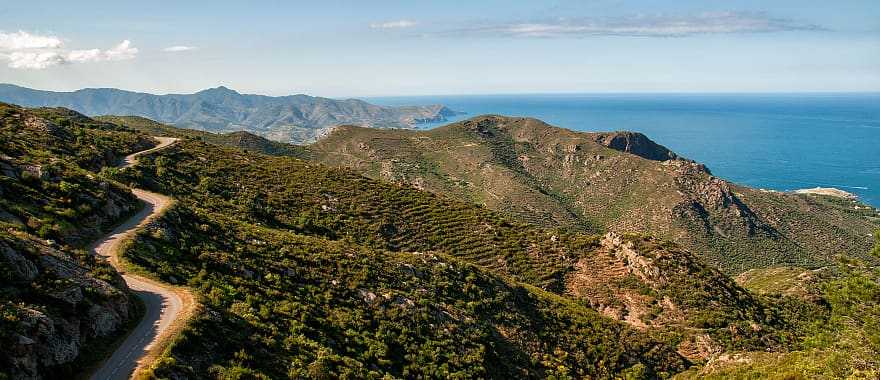 Winding road through mountains in the coast of Cap de Creus, on the way to Girona, Spain,