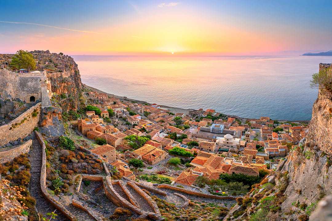 Parorama of old medieval castle town of Monemvasia at sunrise in Peloponnese, Greec