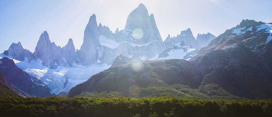 Woman hiking under Fitz Roy in Los Glaciares National Park in Patagonia, Argentina