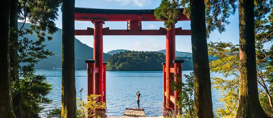 A Torii gate by lake in Hakone, Japan.