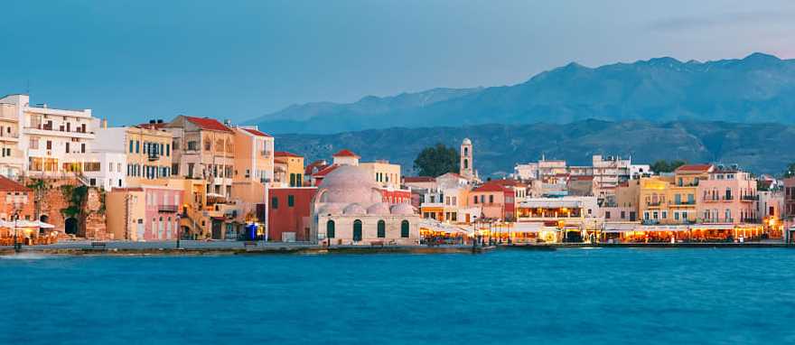 Venetian Quay of Chania with Kucuk Hasan Pasha Mosque during twilight blue hour, Crete, Greece