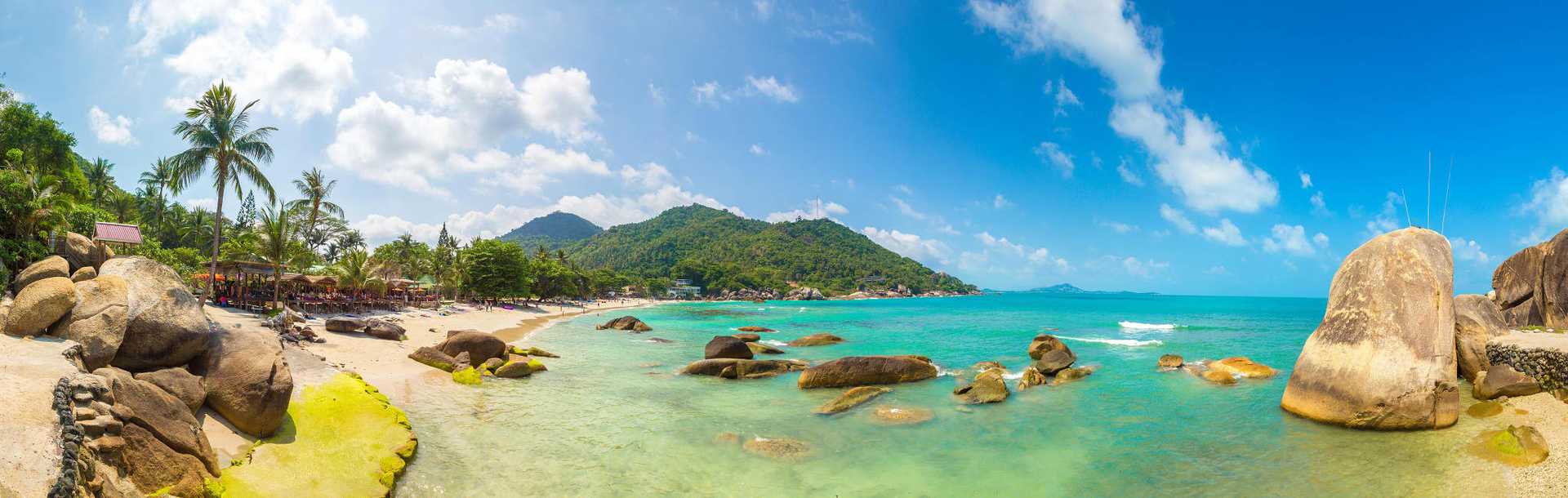 Thailand coastline with light blue waters and white sand