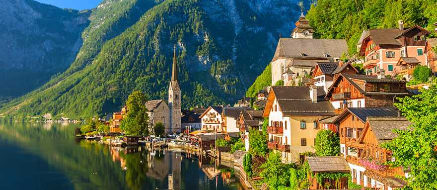 Village and Alpine lake Hallstatt in Austria Famous mountain village and Alpine lake Hallstatt, Austria