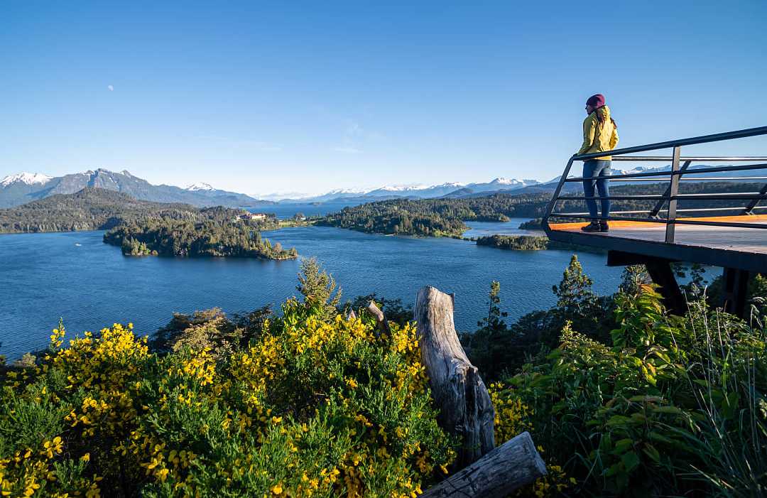 Woman standing at overlook in San Carlos de Bariloche, Argentina