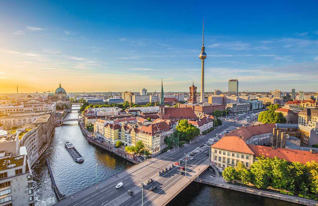 Berlin skyline with famous TV tower and Spree river 