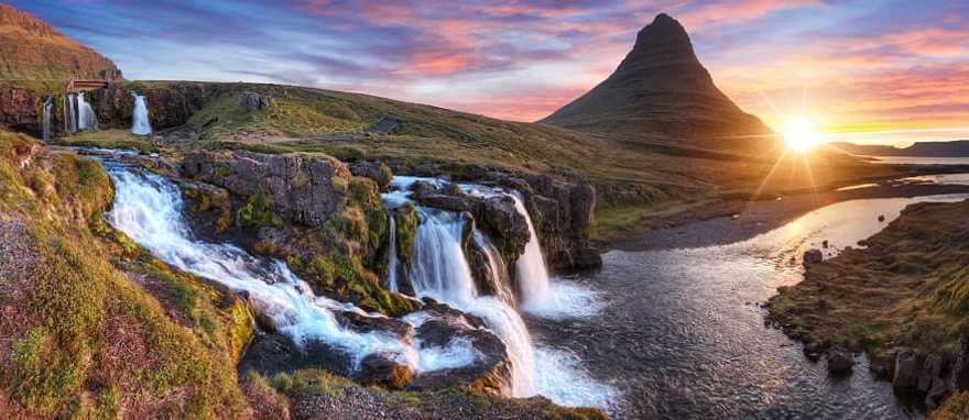 Kirkjufellsfoss and Kirkjufell on the Snæfellsnes peninsula, Iceland Kirkjufellsfoss and Kirkjufell on the Snæfellsnes peninsula, Iceland