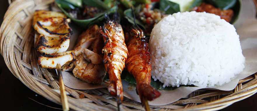 Rice terraces and village in the jungle of Bali Rice terraces and village in the jungle of Bali