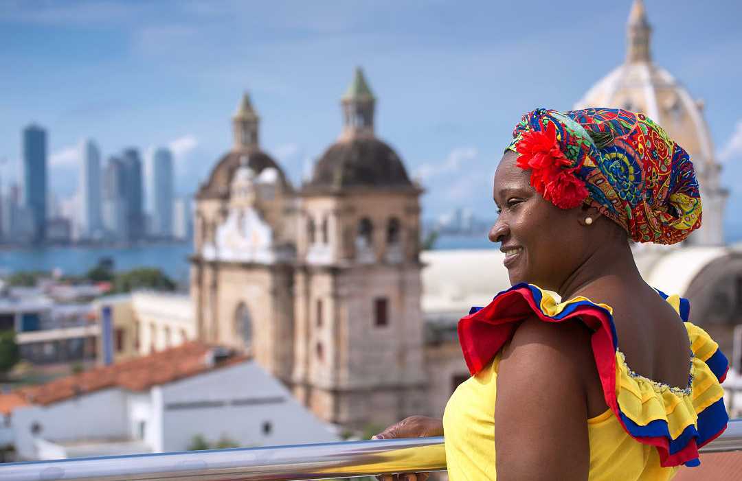 Woman in traditional costume in Cartagena de Indias, Colombia