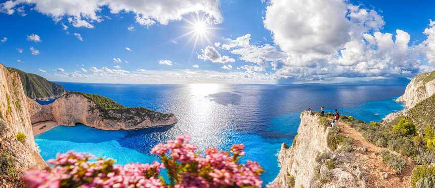 Zakynthos island in Greece. Navagio beach with shipwreck and flowers on Zakynthos island in Greece.