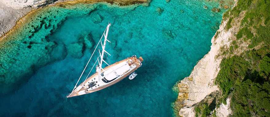 Yacht in a private cove in the Greek Islands.