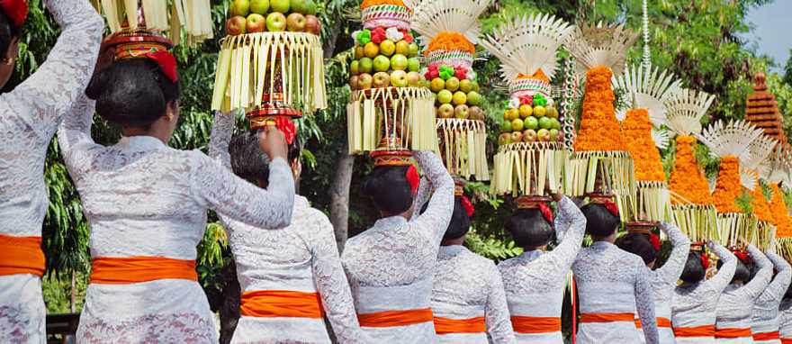 Balinese women in traditional costume during arts and culture festival in Bali Balinese women in traditional costume during arts and culture festival in Bali