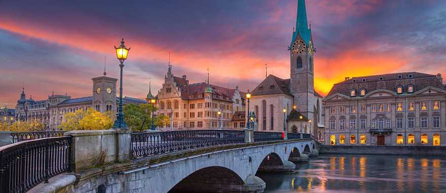 Bridge over the Limmat river leading into the the historic city center of Zurich, Switzerland. Bridge over the Limmat river leading into the the historic city center of Zurich, Switzerland.