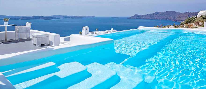 Luxury pool at Canaves Oia Boutique Hotel. Photo by Christos Drazos / courtesy of Canaves Oia Luxury pool at Canaves Oia Boutique Hotel in Santorini, Greece